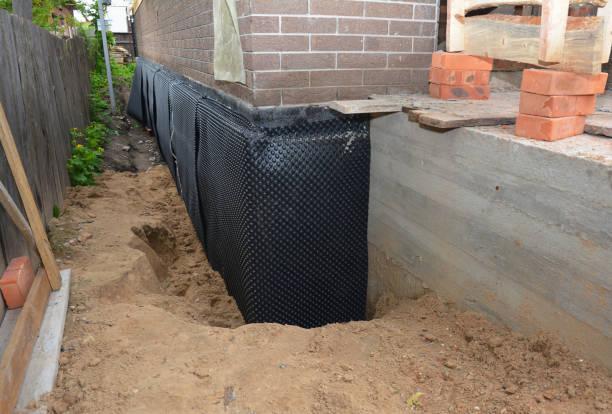 SJ Waterproofing Pros technician performing targeted Vapor Barrier Installation assessment in Memphis, TN